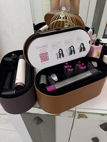 Многофункциональный стайлер Dyson Airwrap в комплекте с различными