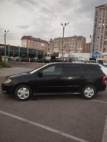 королла китайской сборки: Toyota Corolla: 2003 г., 1.8 л, Автомат, Универсал — 4