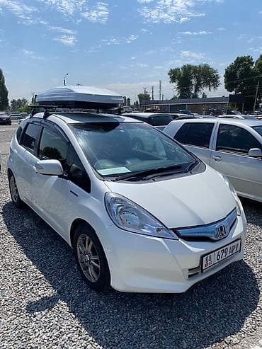 colf 2: Honda Fit: 2012 г., 1.3 л, Вариатор, Гибрид, Хэтчбэк — 3
