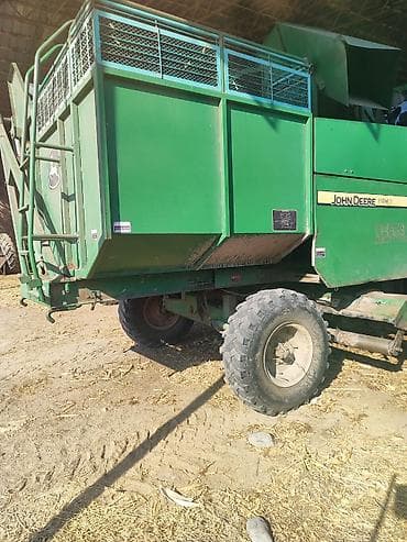 аппарат доить корову: Самоходный кукурузоуборочный комбайн John Deere 215 с кукурузной — 3