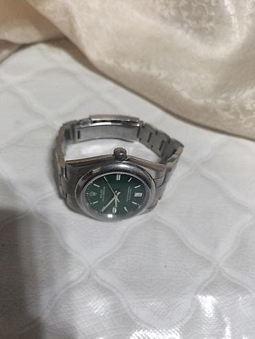 Личные вещи: Часы Rolex Oyster Perpetual с зелёным циферблатом. - Корпус и — 4