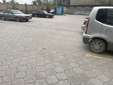 Парковочное место во дворе закрытого жилого комплекса, район Пишпек(