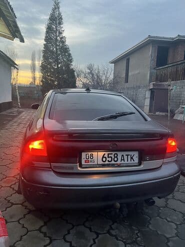 аккумулятор для машины: Mazda 626: 1994 г., Хетчбек — 6