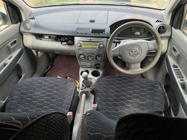 машина ваз: Mazda Demio: 2002 г., 1.3 л, Механика, Бензин — 2