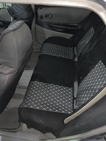 suzuki splash: Mazda 323: 2002 г., 1.6 л, Автомат, Бензин, Универсал — 6