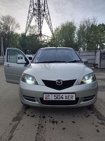 арзан машине: Mazda Demio: 2003 г., 1.3 л, Автомат, Бензин, Хетчбек — 1