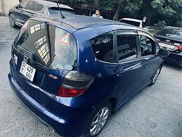 мото мини: Honda Fit: 2009 г., 1.5 л, Автомат, Бензин, Хэтчбэк — 6
