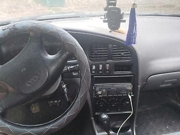 Транспорт: Kia Sephia: 1998 г., 1.5 л, Механика, Бензин, Седан — 8