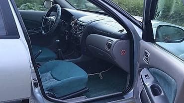 wuling mini ev: Nissan Almera: 2002 г., 1.8 л, Механика, Бензин, Хэтчбэк — 8