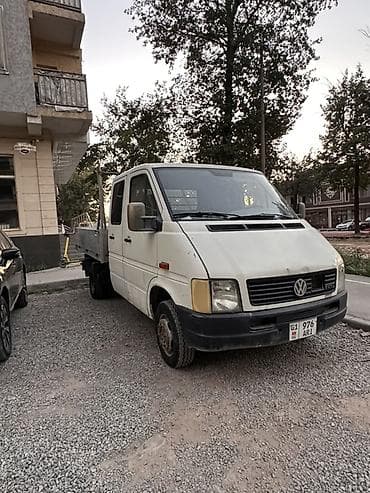 4 4: Volkswagen LT TDI — бортовой грузовик с двойной кабиной. Самосвал — 8