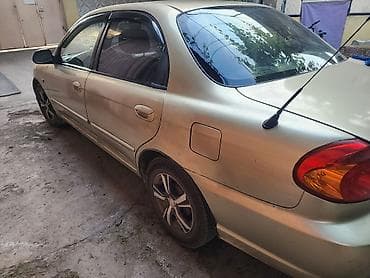 camry 2 2: Kia Spectra: 2007 г., 1.6 л, Механика, Бензин — 2
