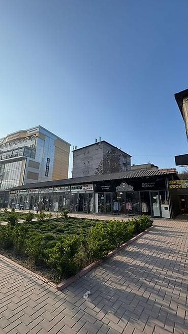 Продажа павильонов: Продажа коммерческого участка с действующим объектом на первой линии — 1