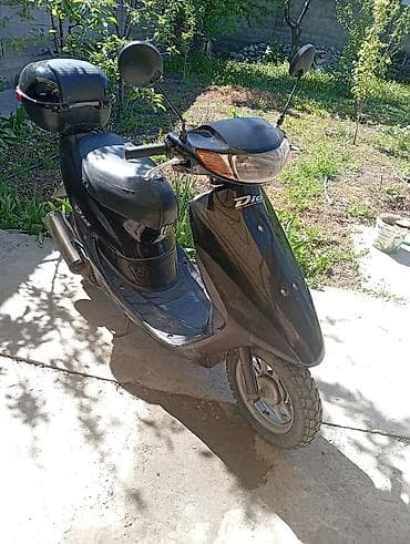 dio 27 af27: Скутер Honda Dio, черный цвет. Особенности и комплектация: - Легкий — 1
