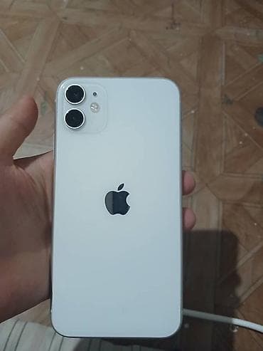 Смартфон Apple iPhone (белый), 64 ГБ. Особенности: - Экран с вырезом — 2