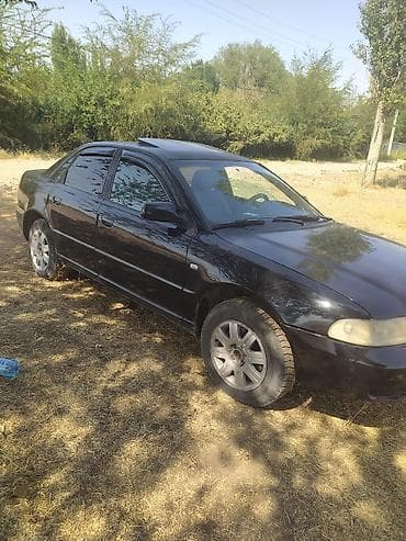 ланос передний бампер: Седан, черный цвет, 4 двери. Кузов с тонированными стеклами, люк на — 1