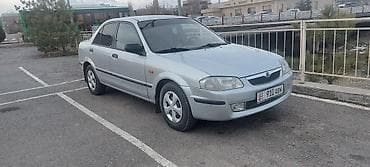 Mazda 323: 1999 г., 1.5 л, Ручные, Бензин, Седан