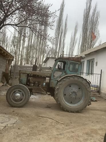 трактор ешка 303: Трактор колесный с кабиной и навесным плугом - Тип — 2