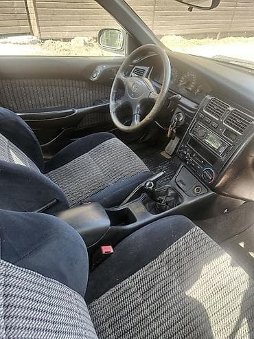 тико 2: Toyota Carina E: 1993 г., 2 л, Кол менен иштөөчү, Бензин, Седан — 8