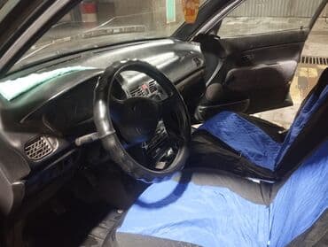 дом обмен на авто: Mazda 121: 1991 г., 1.3 л, Механика, Бензиновая, Седан — 3