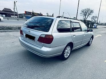 138 стиль: Nissan Primera: 2001 г., 1.8 л, Ручные, Бензин, Универсал — 4