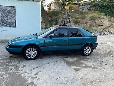 Mazda 323: 1994 г., Лифтбек