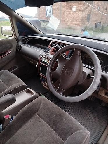 одесей: Honda Odyssey: 1999 г., Газ — 4