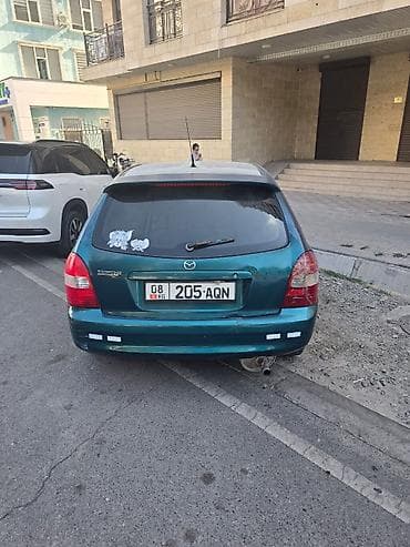 мазда 122: Mazda 323: 1999 г., 1.6 л, Автомат, Бензин, Универсал — 2