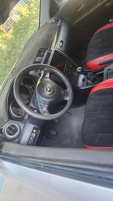 Унаа сатуу: Mazda 3: 2004 г., 2 л, Кол менен иштөөчү, Бензин, Седан — 5
