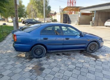 чехол на демио: Mitsubishi Carisma: 1998 г., 1.8 л, Механика, Бензин, Седан — 4