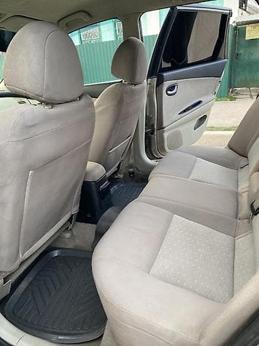 продаю с: Nissan Primera: 2003 г., 1.8 л, Ручные, Бензин, Универсал — 7