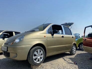 фары на опель вектра б: Хэтчбек Daewoo Matiz в цвете "золотой беж" с пятидверным кузовом — 9
