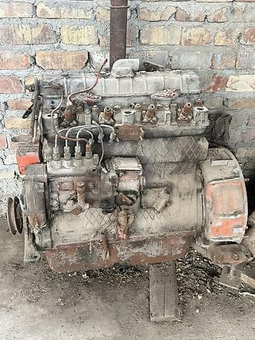Двигатель СМД-14 
Работал . Приехали на нем и сняли — 2