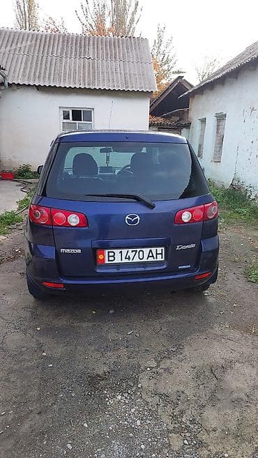 чехлы бу: Mazda Demio: 2004 г., Автомат, Бензин, Хэтчбэк — 8