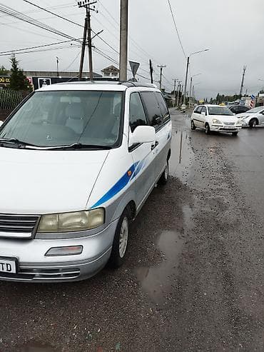 боковой: Nissan Largo: 1996 г., 2.4 л, Автомат, Бензин, Минивэн — 6