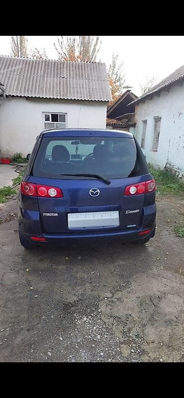 byd e9: Mazda Demio: 2001 г., Хэтчбэк — 1