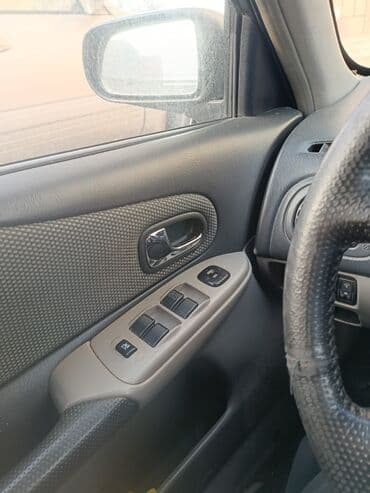 женские авто: Mazda 323: 2003 г., 1.6 л, Автомат, Бензин, Седан — 8