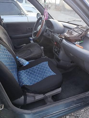 срочное: Nissan Micra: 1995 г., 1 л, Ручные, Бензин, Хэтчбэк — 4