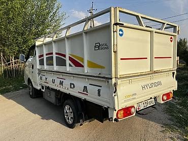 грузовики легкие: Hyundai Porter II грузовой бортовой - Компактный городской грузовик с — 3
