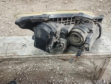 ml 163: Передняя левая фара Toyota 2004 г., Б/у, Германия — 2