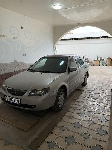 Mazda 323: 2003 г., 1.6 л, Ручные, Бензин, Седан