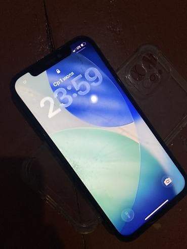 IPhone 12, 64 ГБ, чёрный цвет. Комплектация на фото: смартфон и — 2