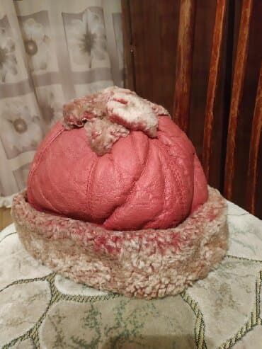 Шапка из натуральной цигейки б/у, в хорошем состоянии