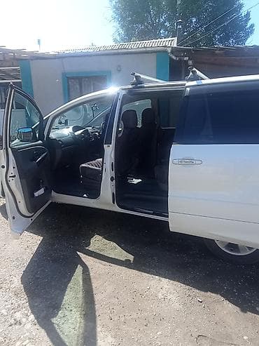 тайлта прадо: Toyota Estima: 2004 г., Автомат, Газ — 5