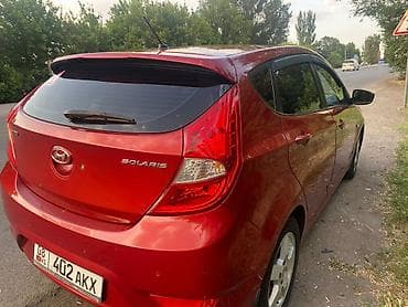 nisan march: Hyundai Solaris: 2011 г., 1.6 л, Автомат, Хэтчбэк — 3