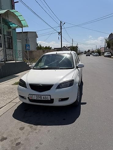 спойдер: Mazda Demio: 2002 г., 1.5 л, Автомат, Бензин, Хэтчбэк — 1