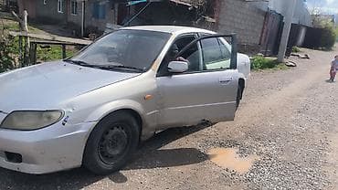 star diagnostic: Mazda Familia: 2003 г., Автомат, Седан — 3