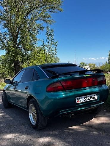 салон на gx470: Mazda 323: 1995 г., 1.5 л, Механика, Бензин, Хэтчбэк — 3