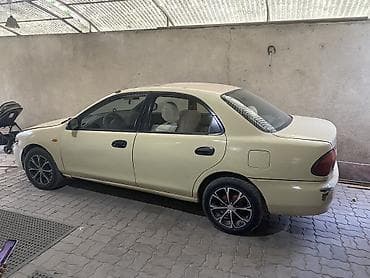 4a fe: Mazda 323: 1995 г., 1.6 л, Автомат, Бензин, Седан — 3