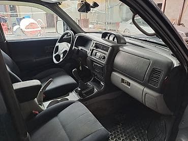 боковой: Mitsubishi Pajero Sport: 2002 г., 2.5 л, Механика, Дизель, Внедорожник — 5