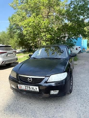 Mazda Familia: 2002 г., 1.6 л, Автомат, Бензин, Седан
